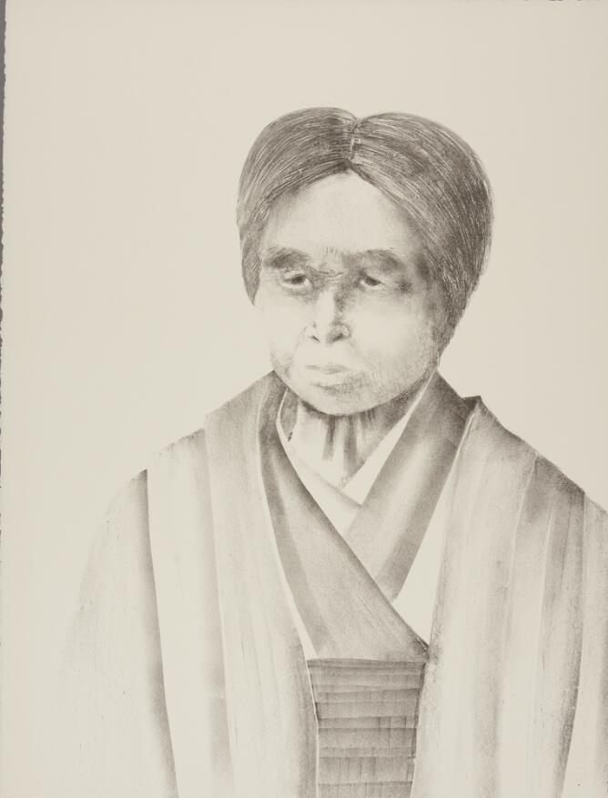 A black and white portrait of an older woman with short hair wearing a kimono, shown from the chest up