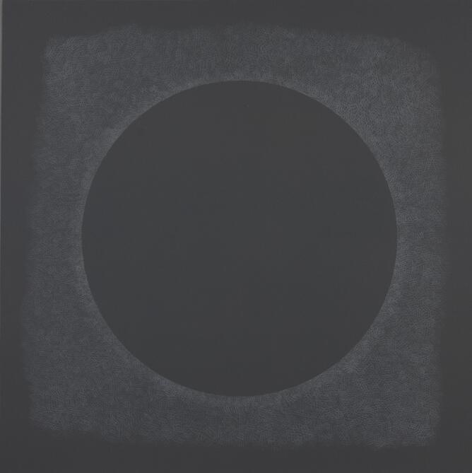 An abstract print of a large black circle surrounded by faint white cross-hatching marks against a black background