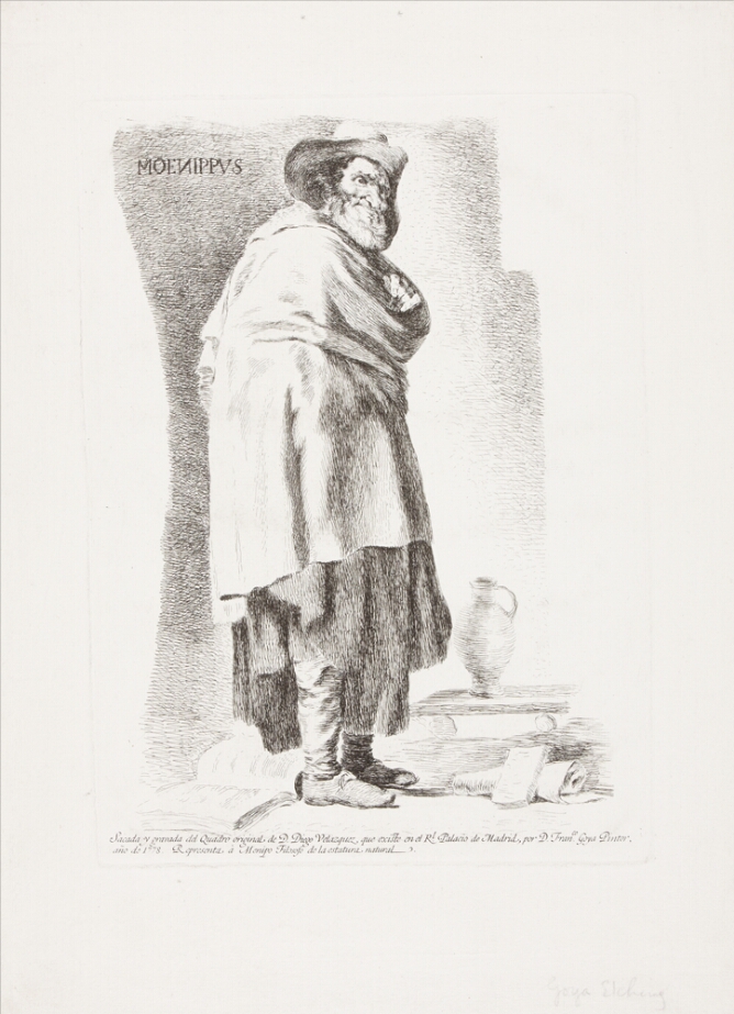 A black and white print of a standing man wearing a hat and cape turning towards the viewer, with an open book at his feet