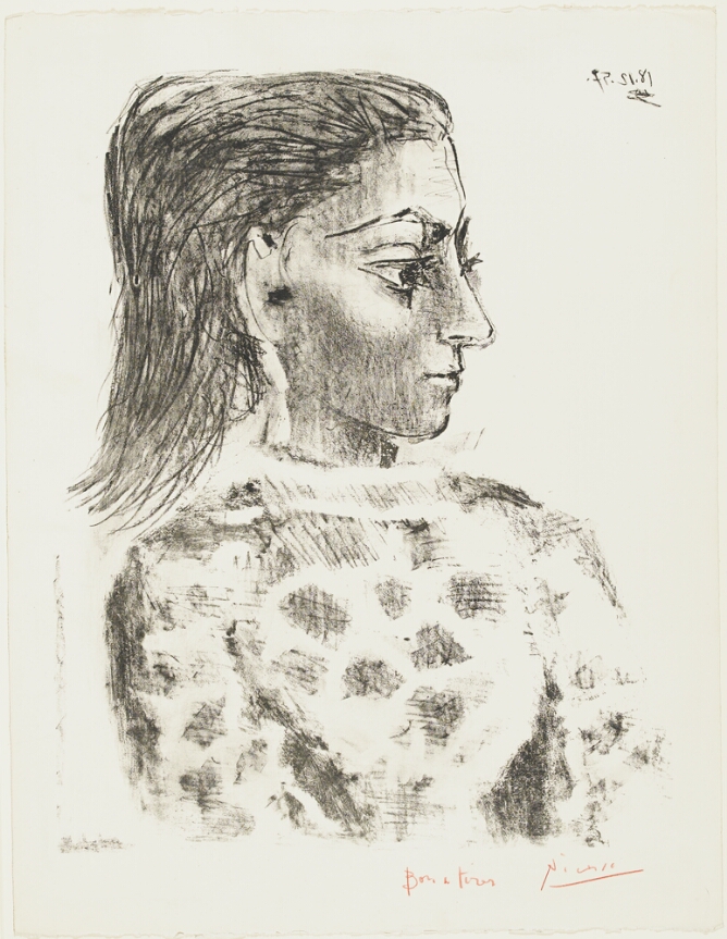 A black and white portrait of a young woman with her head turned to her left, wearing checkered print clothing, shown from the chest up