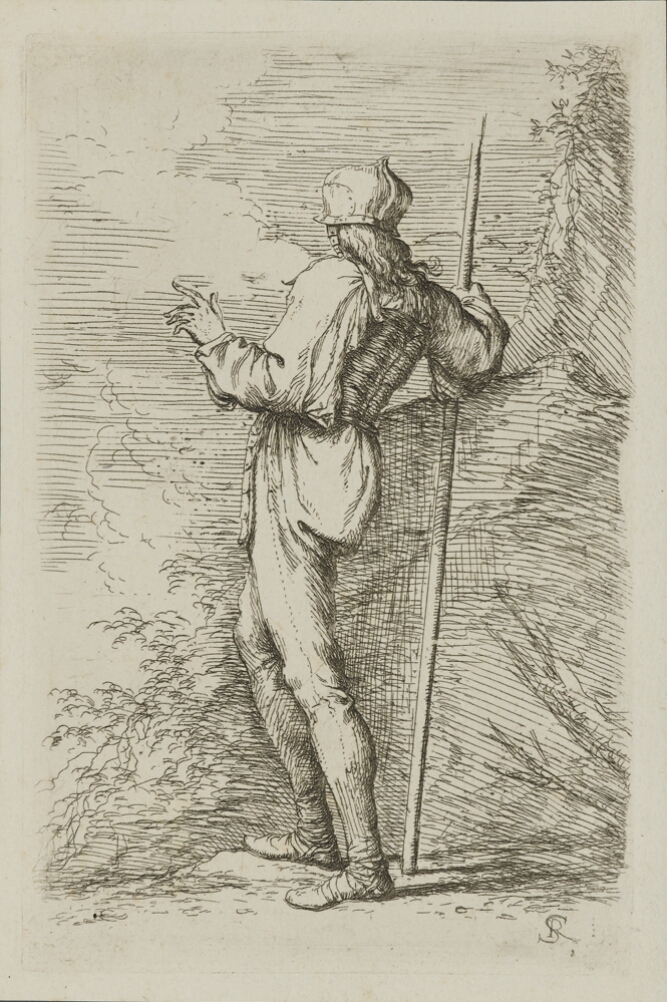 A black and white print of a man standing by a rocky wall, turned away from the viewer and holding a long cane