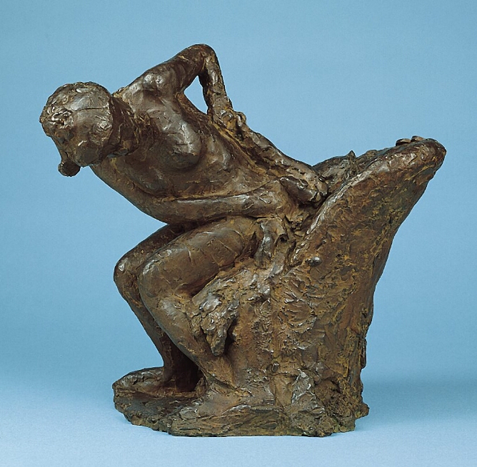 Seated woman wiping her left hip