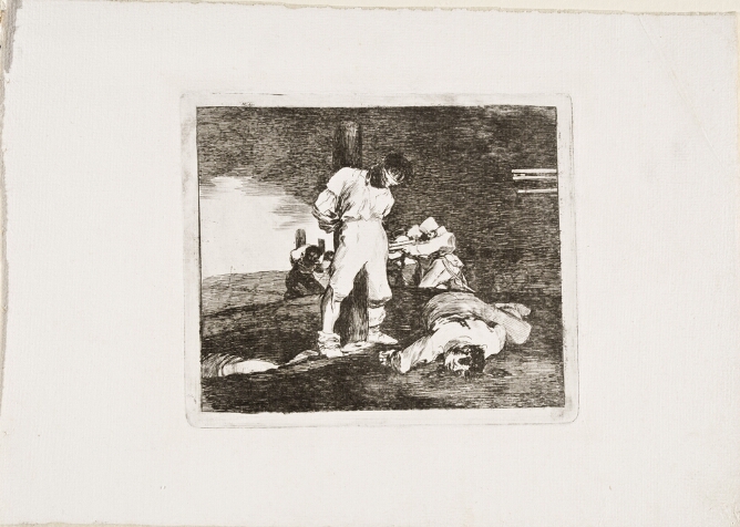 A black and white print of a standing man, blindfolded and tied to a post with a lifeless body on the ground beside him. In the background, soldiers aim their rifles towards other figures tied to posts
