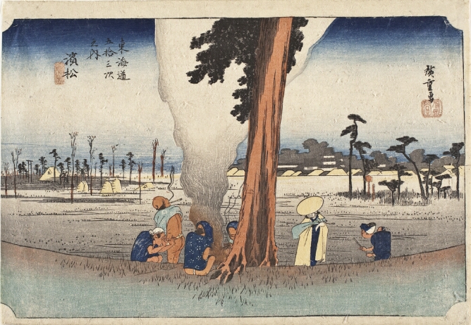 A color print of figures by a central tree warming themselves by a fire with smoke rising to the top of the composition. A cloaked standing figure and a woman carrying a baby on her back to the viewer's right, with a field and village beyond