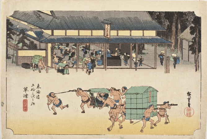 A color print of men transporting a figure in a covered seat, while other men carry cargo. Behind them, figures eat and drink at a teahouse