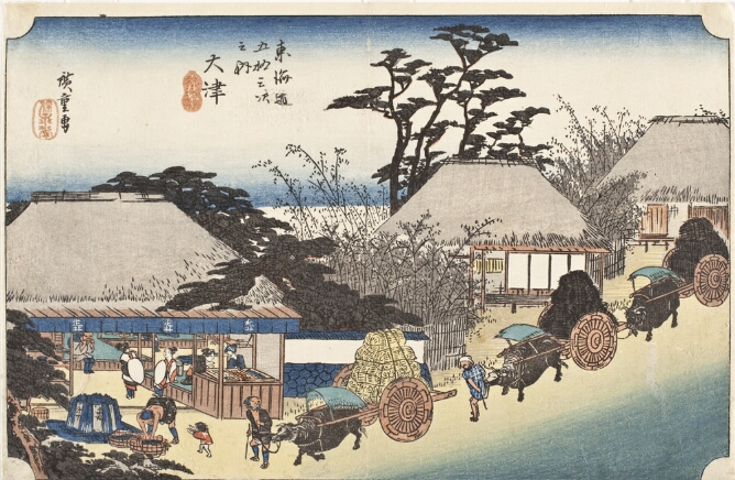 A color print of a teahouse with a gushing spring in front, and figures guiding oxen pulling loaded carts down a village street
