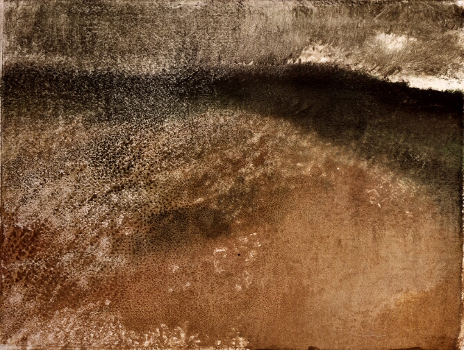 An abstract mixed media print of a landscape featuring a wash of brown bleeding into a small area of black with a smokey gray sky