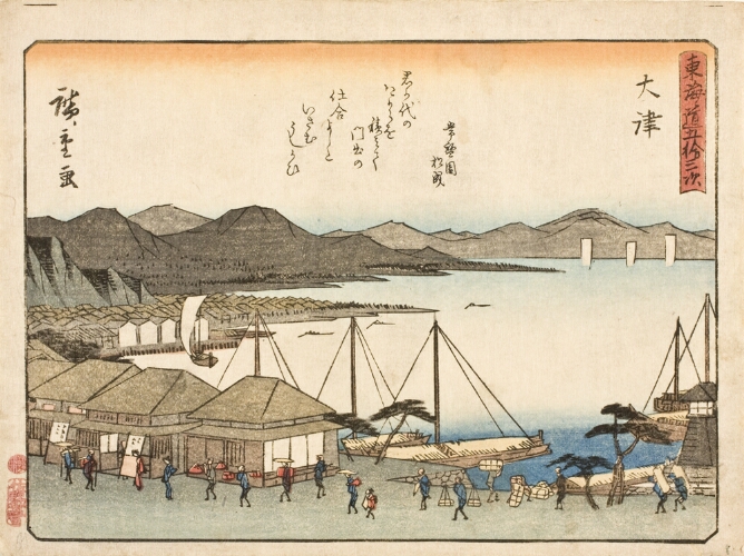 A color print showing a bird's eye view of figures walking along a shop-lined street by boats docked on a lake, with mountains in the distance