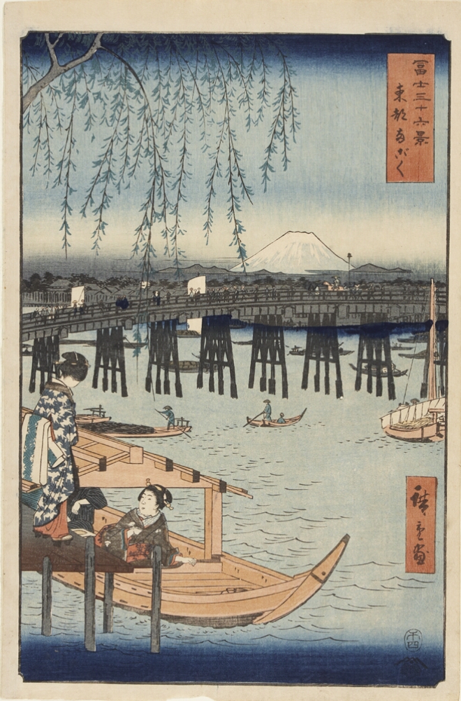 A color print of a woman sitting in a covered boat, engaging with another woman standing on a dock. Behind, figures cross a bridge over a river where other figures are poling boats. A white mountain in the distance