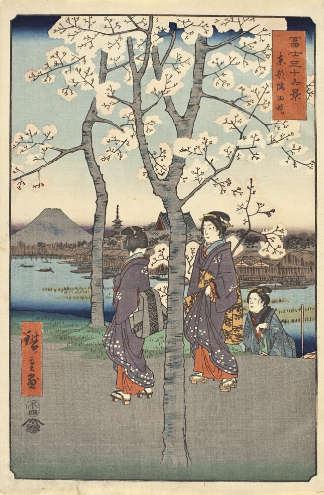 A color print of two women in kimonos walking along a street of blooming pink trees, one looking back, and a third woman ascending towards the street, with a view of a river, city and mountain behind them