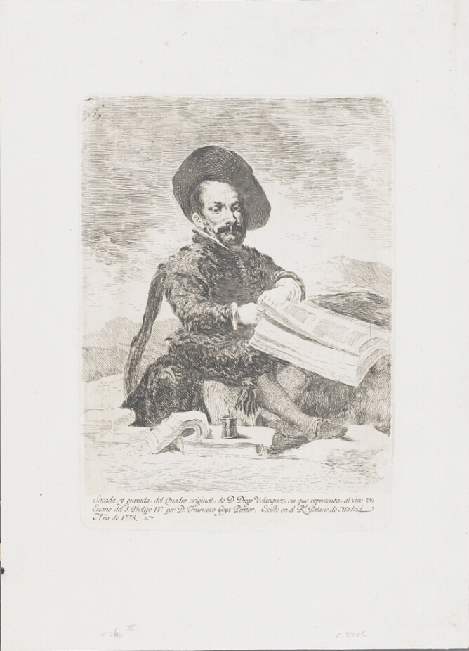 A black and white print of a man of short stature wearing a hat, sitting and leafing through the pages of a large book
