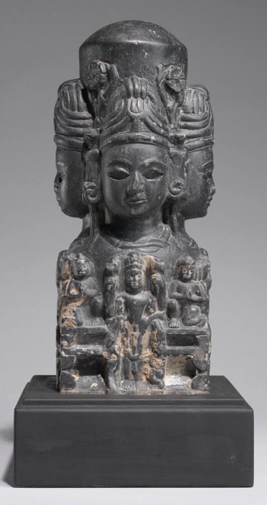 Shivalingam with Faces and Figures