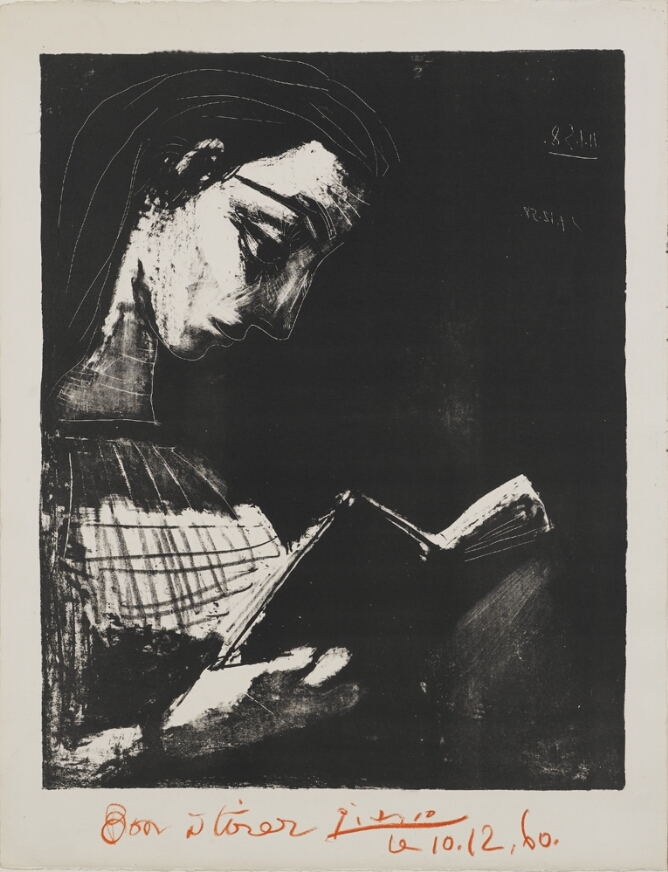 A black and white, high contrast portrait of a young woman reading