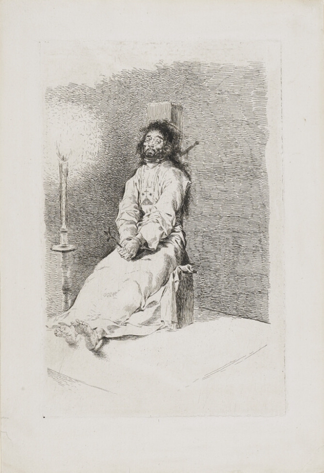 A black and white print of a man sitting with his back to a post, neck restrained in a collar, legs outstretched, with his hands bound and holding a crucifix