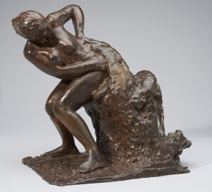 Seated woman wiping her left side