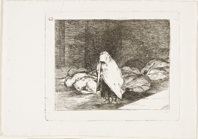 A black and white print of a standing hooded figure with covered bundles lying on the ground behind