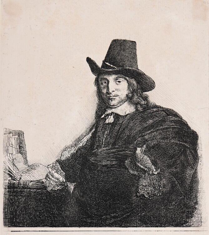 A black and white portrait of a man wearing a tall hat shown from the waist up with his left hand on his hip and right hand on a desk with books