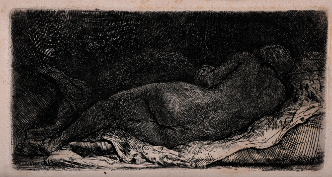 A black and white print of a nude woman seen from behind in darkness lying on a sheet over a cushion