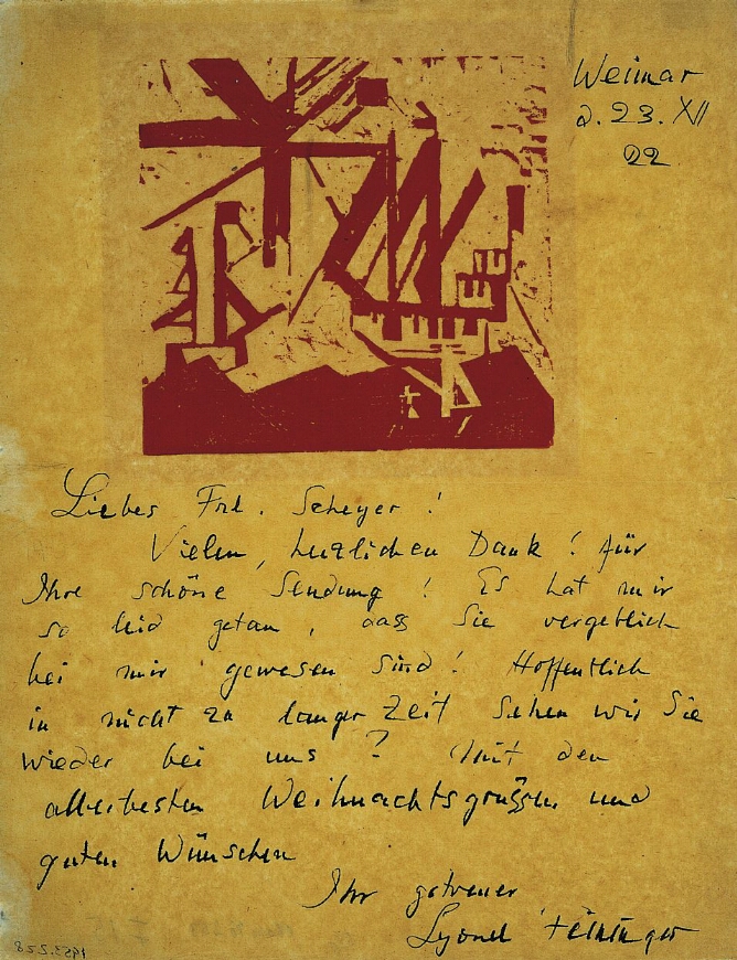 A handwritten letter with an abstract print at the top of red triangles and intersecting lines