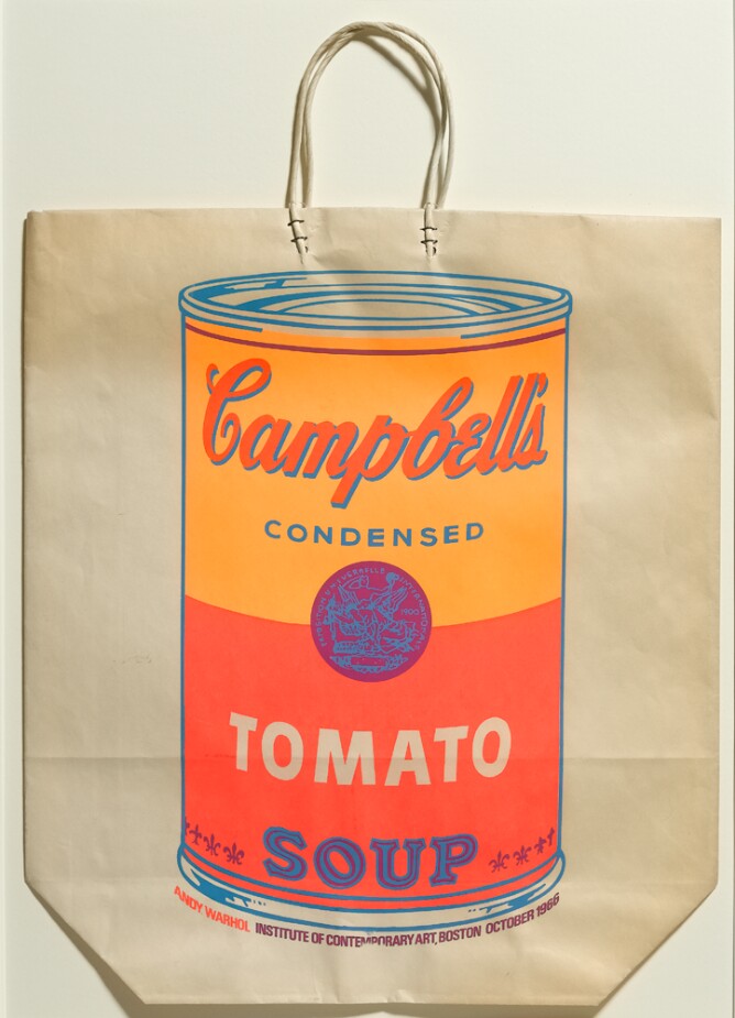 A large light orange and red Campbell's tomato soup can printed on a tan paper shopping bag