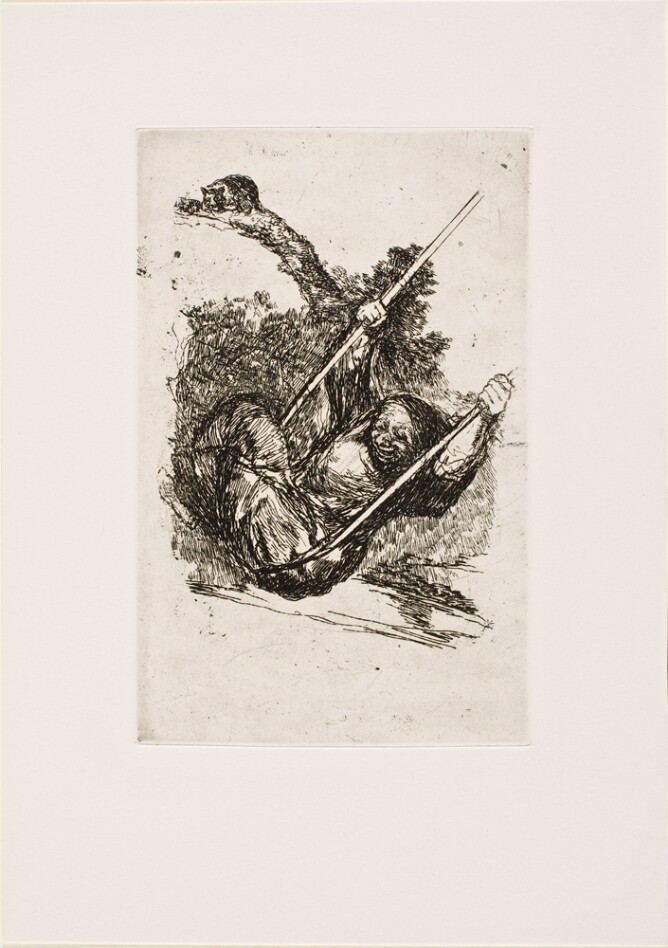 A black and white print of a smiling older woman swinging on a rope swing