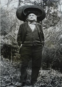 Jacques Lipchitz Standing in Front of His Sculpture "Figure"